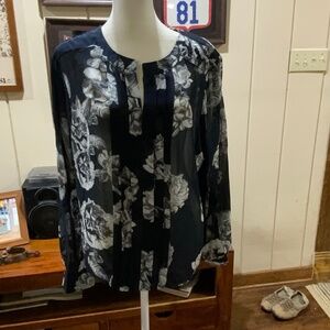 Ann Taylor dark blue blouse with off white flowers.  Size large